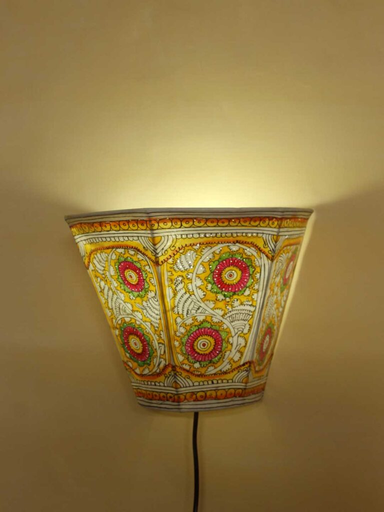 Yellow-floral-tholu-bommalata-wall-lamp at Shilphaat.com
